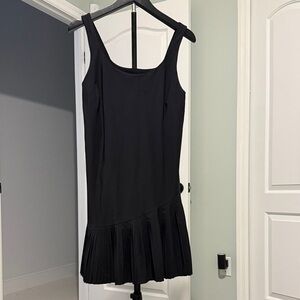 SPANX Black Sleeveless Pleated-Hem Mini Dress